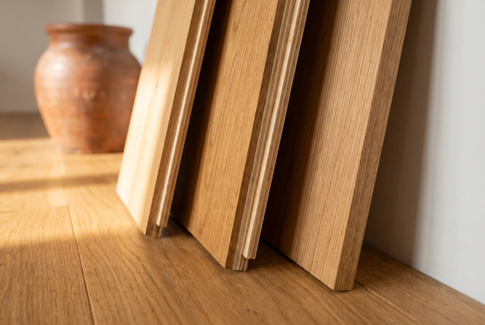Chants de lames montrant la structure du parquet contrecollé