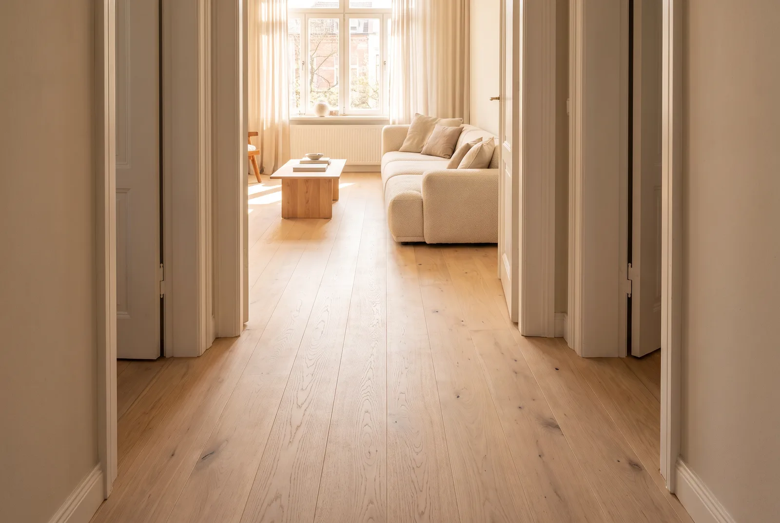 Parquet continu du couloir au séjour sans seuil